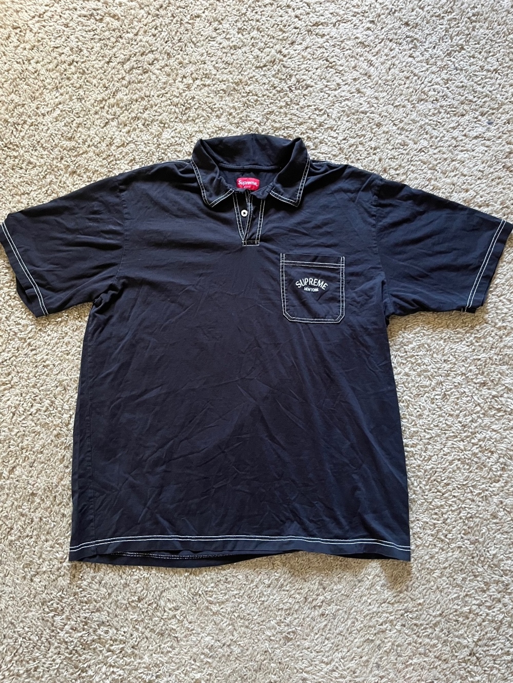 Supreme Black Polo Shirt with White Stitching and Chest Pocket Logo Size L